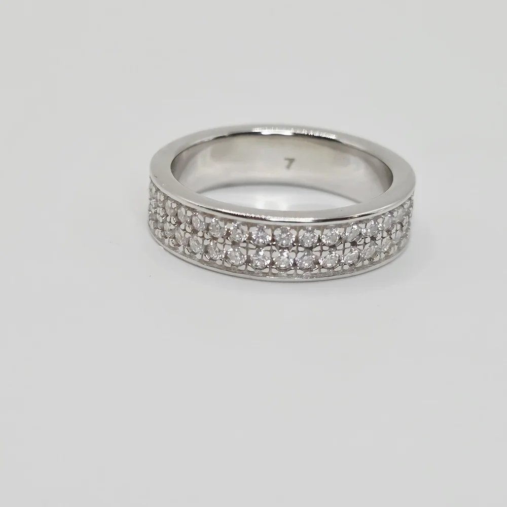 This is a 2 Row Moissanite Diamonds Band . S925 Silver. vvs1 D. size 7